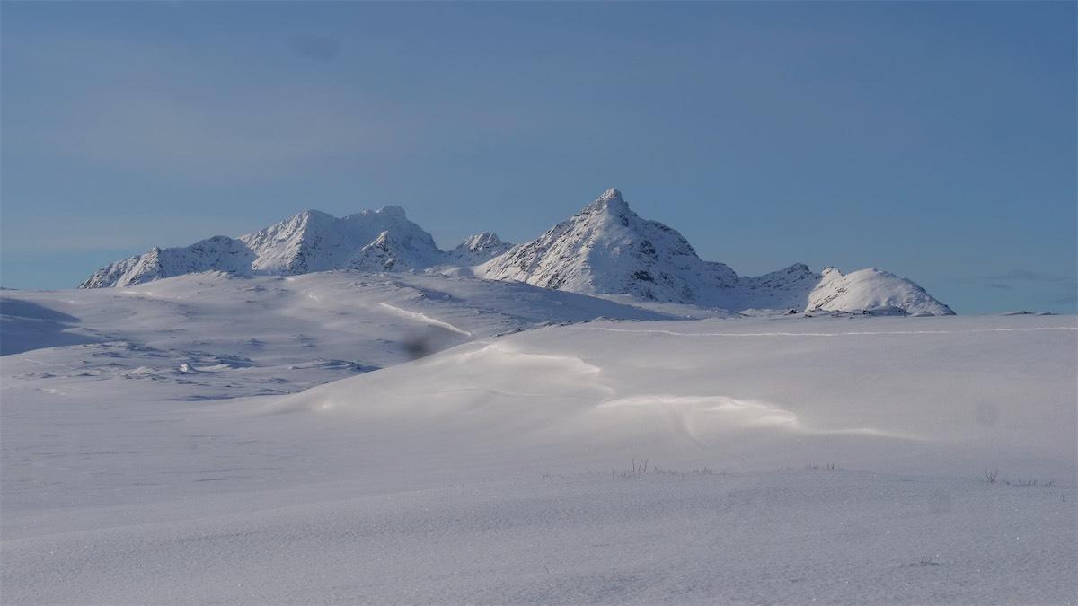 Snowy mountains over the sea